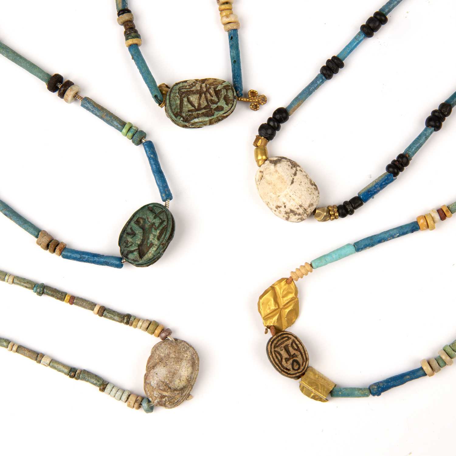 Lot 166 - Five Egyptian scarabs with hieroglyphics all...