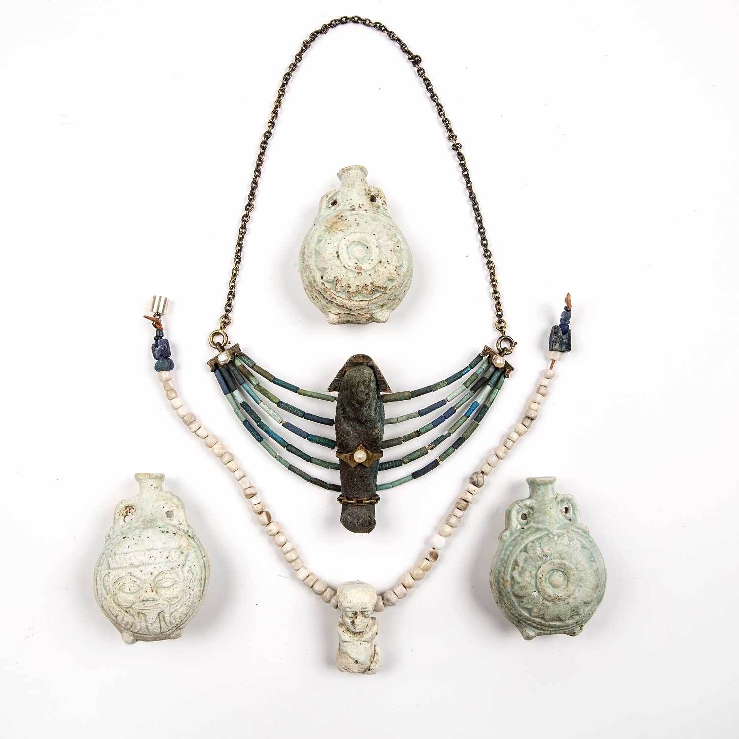 Lot 167 - Egyptian artifacts to include a faience amulet...