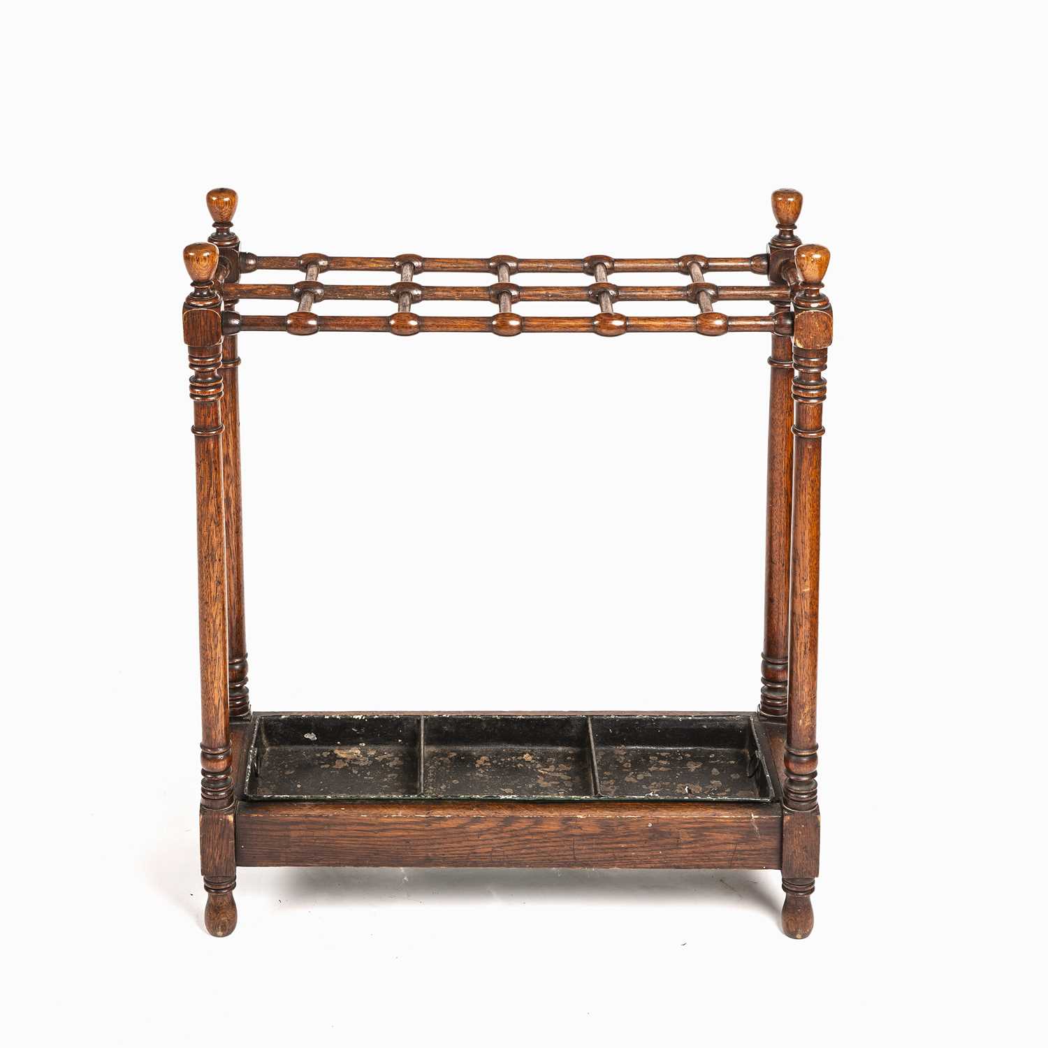 Lot 93 - An early 20th century turned oak stick stands...