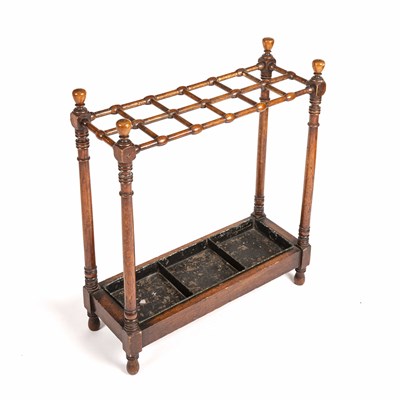 Lot 93 - An early 20th century turned oak stick stands...