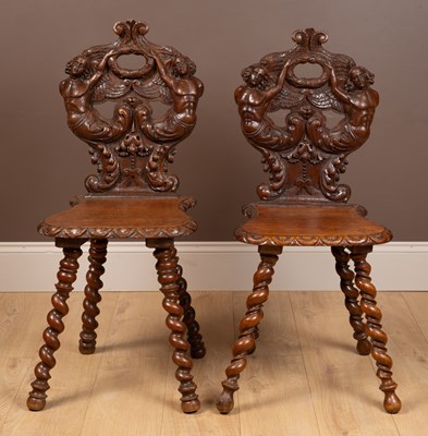 Lot 118 - A pair of 19th century Swiss hall chairs