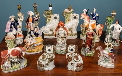 Lot 502 - A collection of Staffordshire figures and animals