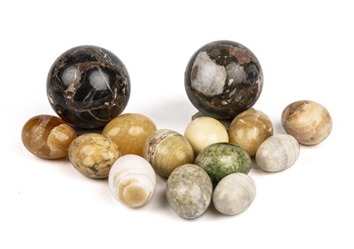 Lot 115 - Two polished hard stone spheres 9cm and 8cm...