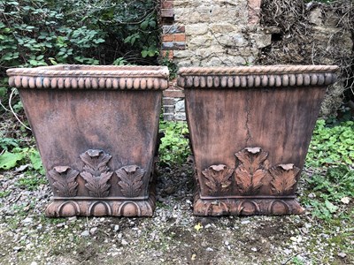 Lot 550 - A pair of cast terracotta coloured garden planters