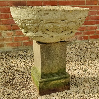 Lot 506 - A cast reconstituted stone circular bowl shaped planter together with a stone plinth