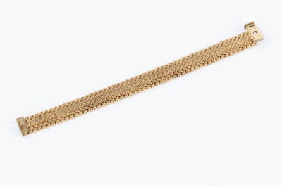 Lot 1 - A 9ct gold fancy-link bracelet, of textured...