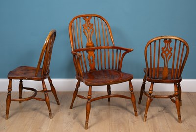 Lot 129 - A set of seven Windsor kitchen chairs