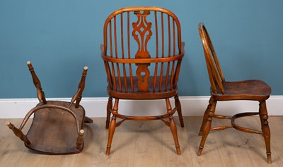 Lot 129 - A set of seven Windsor kitchen chairs