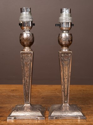 Lot 219 - A pair of white metal table lamps