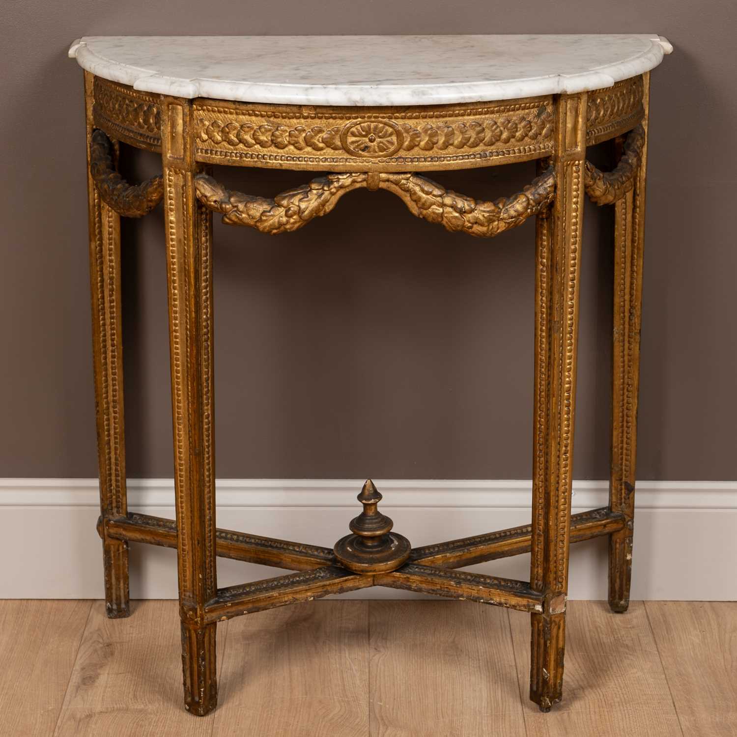 Lot 51 - A 19th century Continental gilt carved, wooden, gesso moulded, console table with a marble top