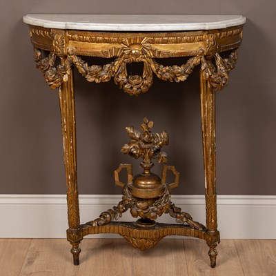 Lot 336 - An 18th or early 19th century Continental gilt marble-topped console table