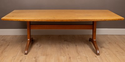 Lot 338 - A mid-20th century, possibly Cotswold school, possibly satin birchwood veneered dining table