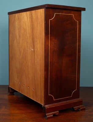 Lot 461 - A mahogany table top chest of four drawers