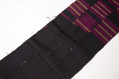 Lot 184 - A Nigerian indigo blue strip woven cotton...