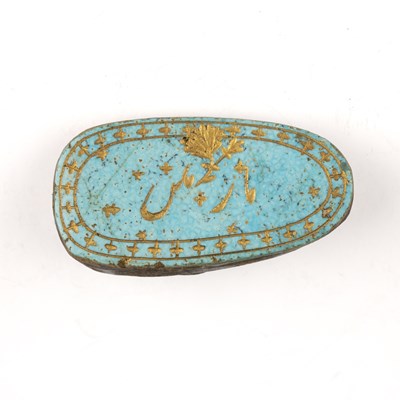 Lot 189 - An antique turquoise stone carved and gilded...