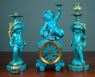 Lot 421 - An early 20th century garniture de cheminée