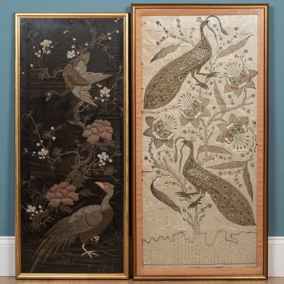 Lot 422 - Two needlework pictures depicting exotic birds in silver threads