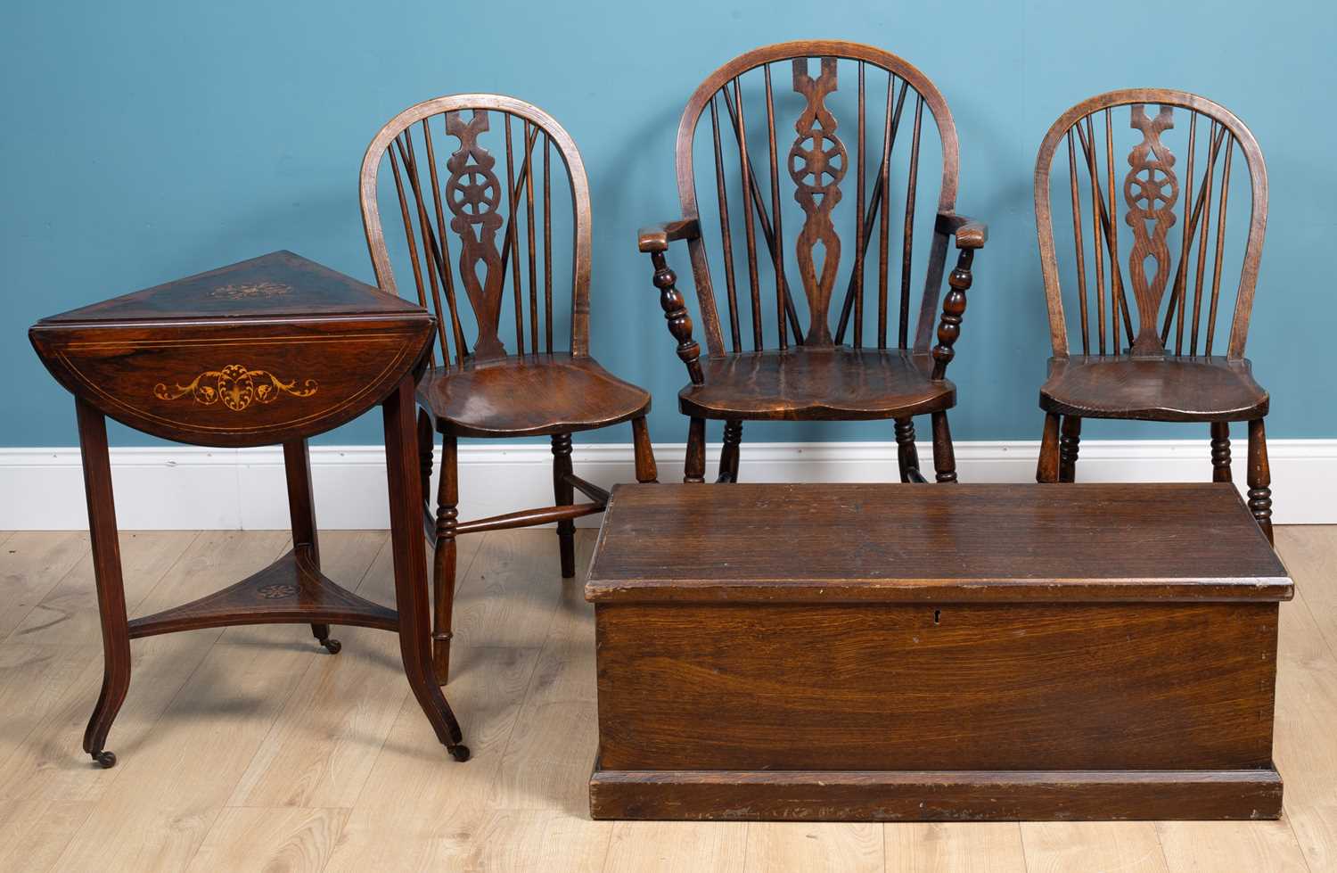 Lot 489 - A set of three wheel back chairs, a scumbled chest, and an Edwardian mahogany drop leaf table