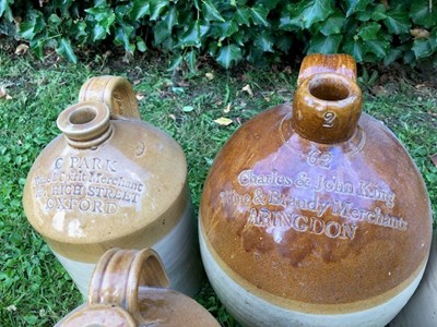 Lot 667 - A group of seven stoneware bottle and jars of local interest