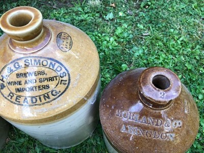 Lot 667 - A group of seven stoneware bottle and jars of local interest