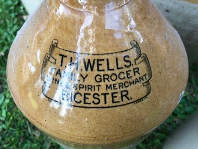 Lot 667 - A group of seven stoneware bottle and jars of local interest