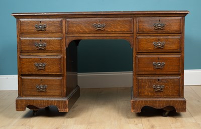 Lot 407 - An oak William IV pedestal desk