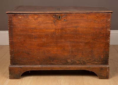 Lot 127 - An 18th century and later elm box or trunk