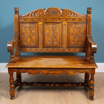 Lot 497 - A 20th century carved Italian settle