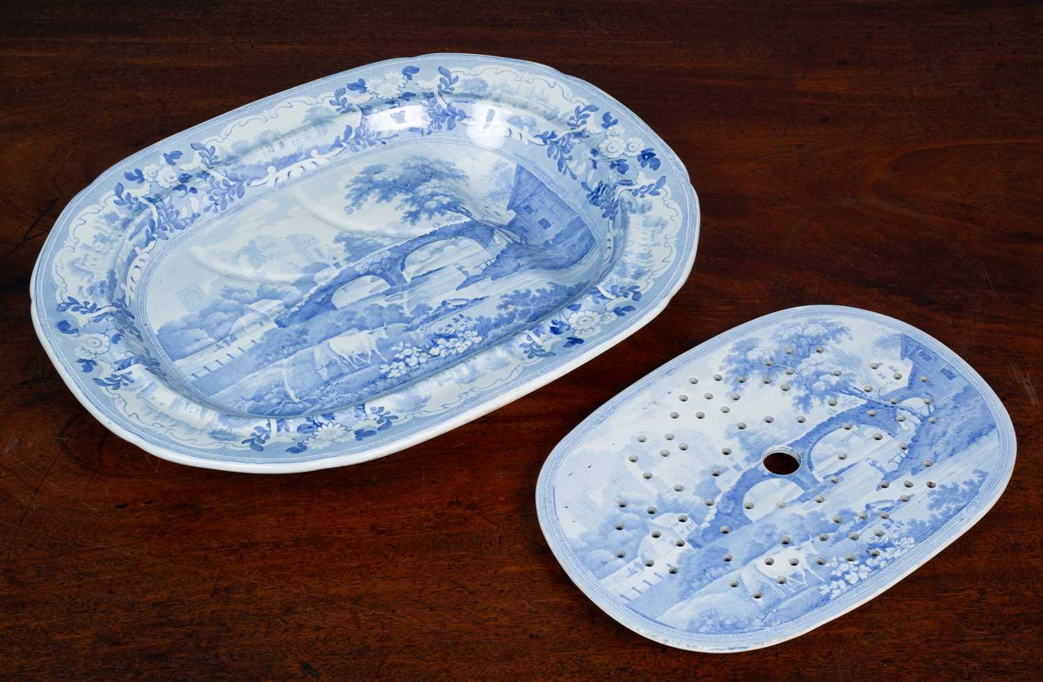 Lot 123 - A 19th century blue and white transfer printed meat platter