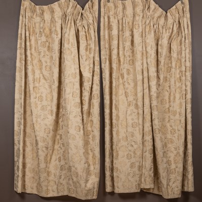 Lot 289 - Two pairs of cream curtains together with two matching pelmets and four swags