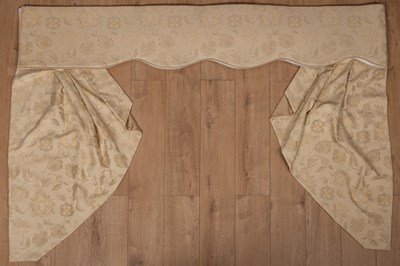Lot 289 - Two pairs of cream curtains together with two matching pelmets and four swags