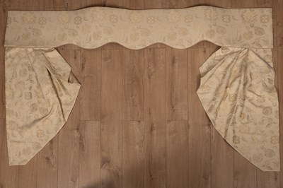 Lot 289 - Two pairs of cream curtains together with two matching pelmets and four swags