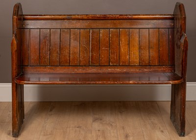 Lot 128 - An early 20th century pine pew