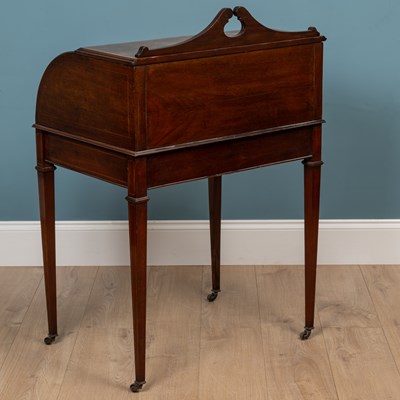 Lot 454 - A 20th century reproduction Regency style cylinder desk