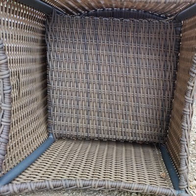 Lot 575 - An oval glass topped garden table together with a set of eight faux wicker chairs