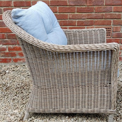 Lot 547 - A set of four Lloyd Loom style wicker armchairs