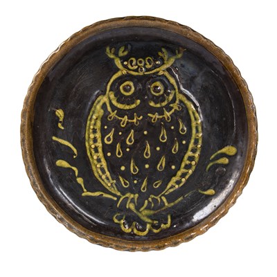 Lot 209 - An antique slipware pottery dish decorated...