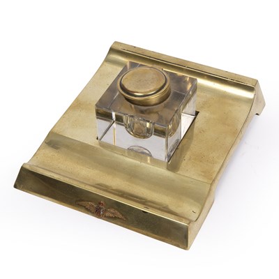 Lot 211 - A brass and glass desk ink stand with an RAF...