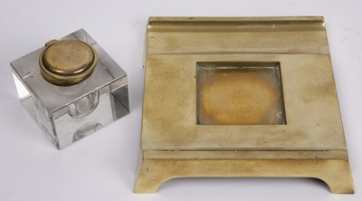 Lot 211 - A brass and glass desk ink stand with an RAF...