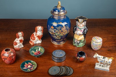 Lot 440 - A collection of ceramics to include three items of early Moorcroft