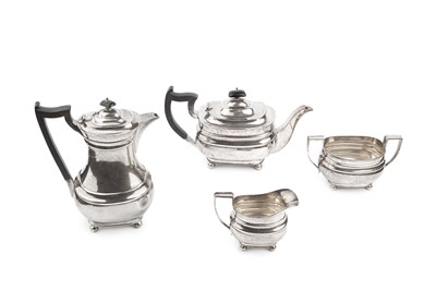 Lot 655 - A George V silver four piece tea service, of...