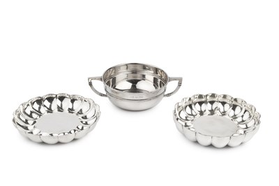 Lot 637 - A pair of silver dishes, of lobed shallow form...