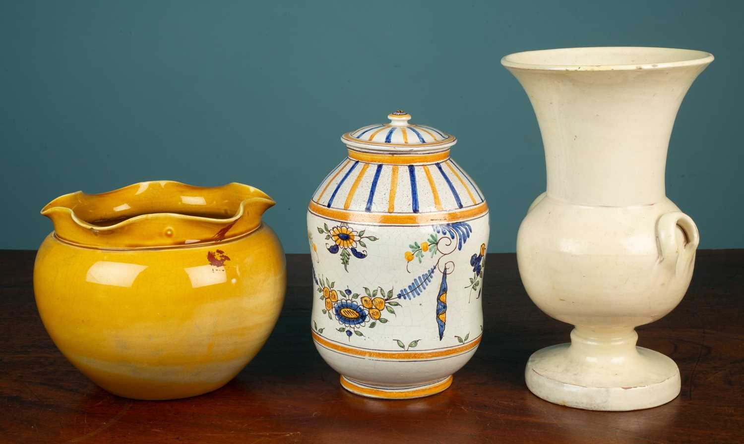 Lot 86 - A tin glazed albarello together with a planter and vase