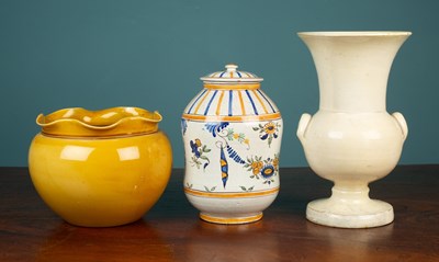 Lot 86 - A tin glazed albarello together with a planter and vase