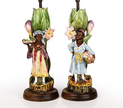 Lot 242 - A pair of late 19th century Majolica figural...