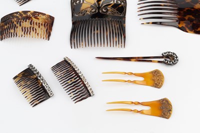 Lot 535 - A tortoiseshell hair comb, with pierced and...