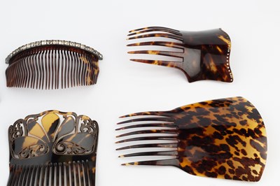 Lot 535 - A tortoiseshell hair comb, with pierced and...