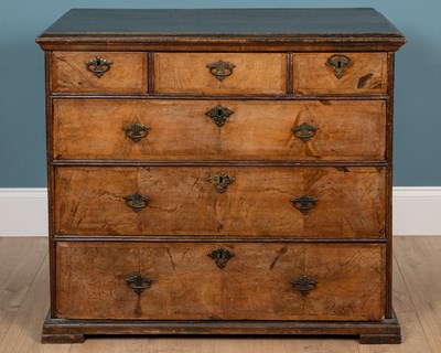 Lot 534 - An 18th century mahogany chest of three short over three long drawers