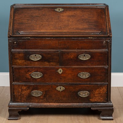 Lot 535 - A 17th century walnut bureau