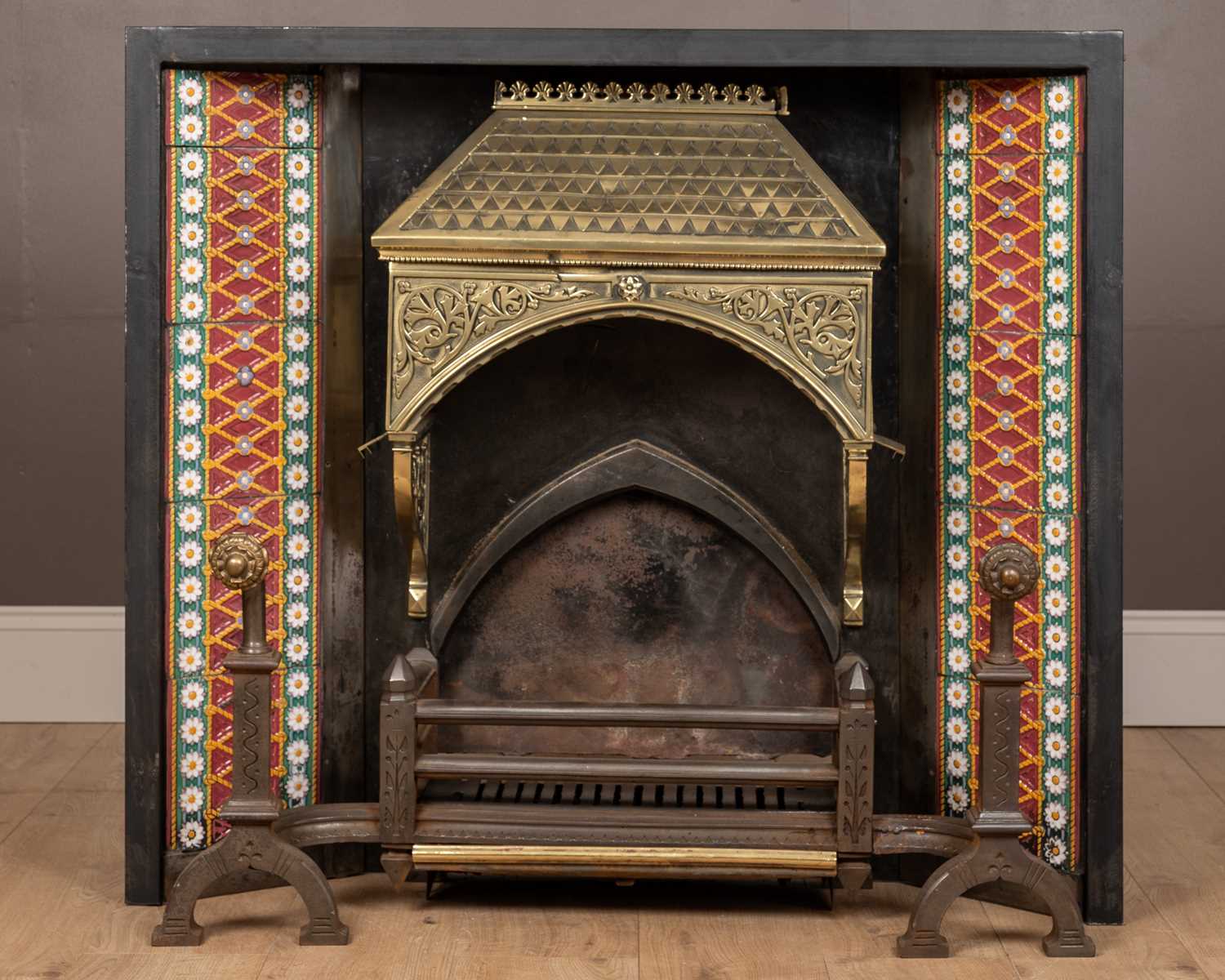 Lot 589 - An Aesthetic Movement fire surround of Majolica tiles